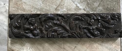 17th Century Carved Oak Panel of Cherubs as Flower Stamen