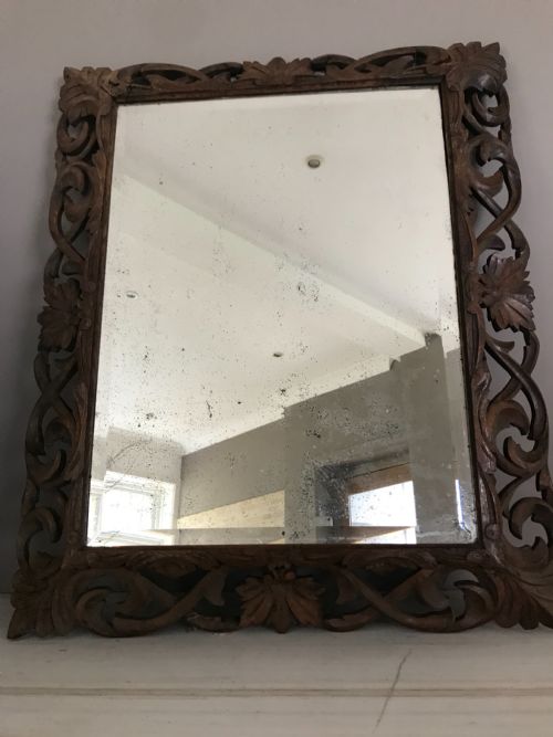 French Large Antique Carved Black Forest Cushion Mirror