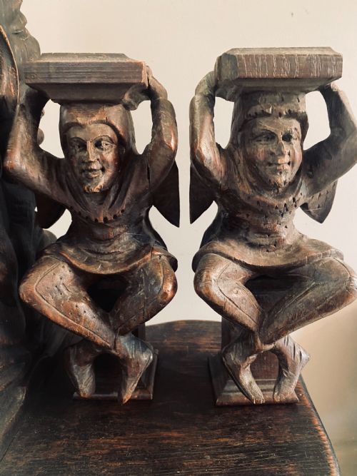19th Century Carved Oak Winged Jester's