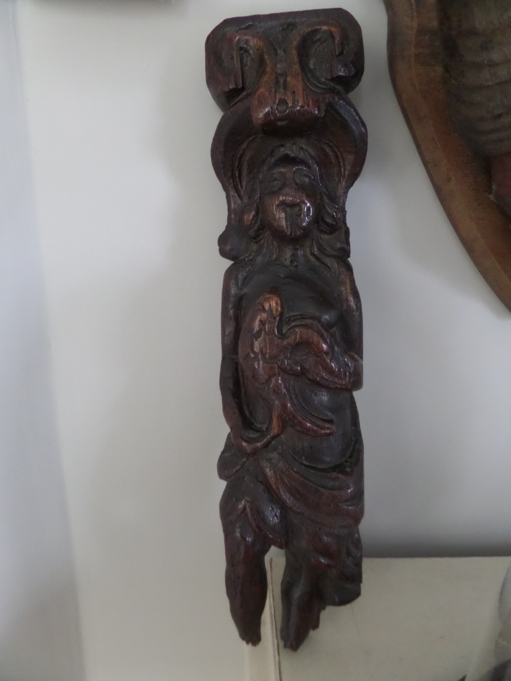 17th Century Carved Oak Caryatid holding eagle Panel