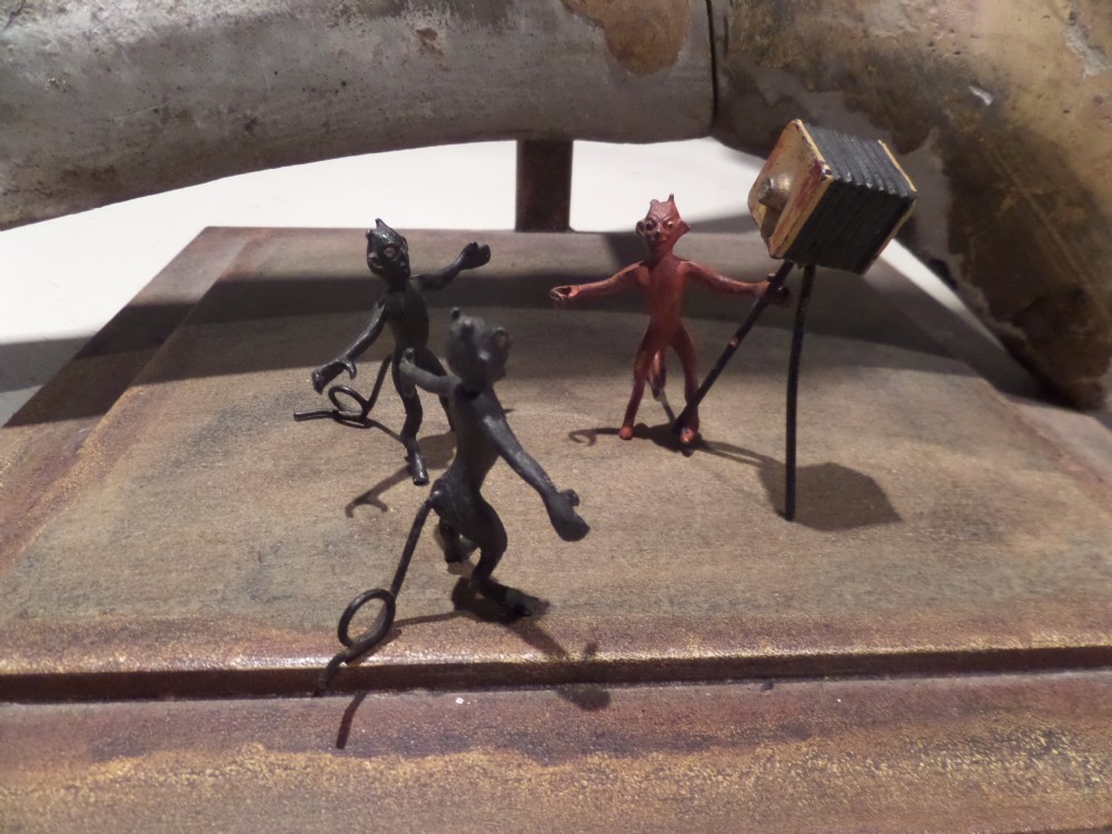 Antique cold Painted Bronze Set of Black Red Devils Photographer