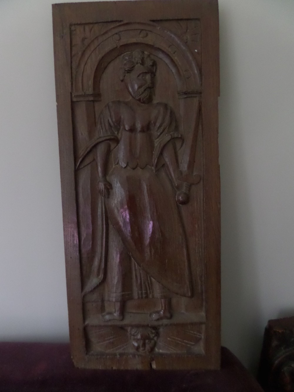 16TH CENTURY CARVED OAK SAINT WITH DECAPITATED WINGED ANGEL PUTTO Panel