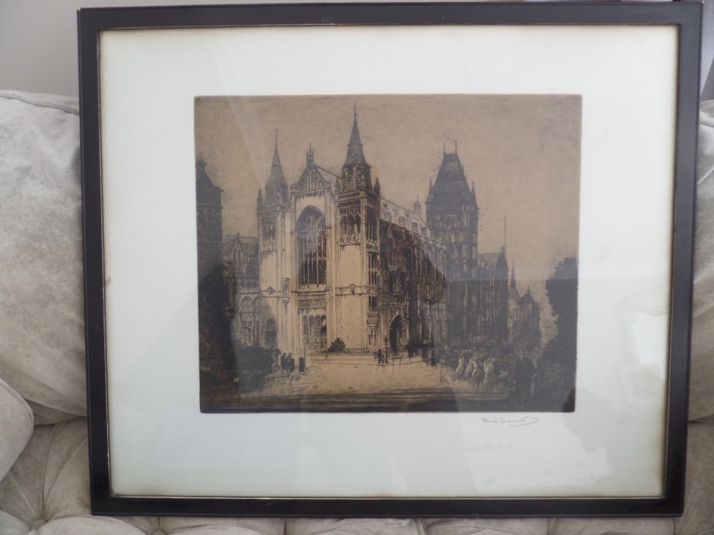 A framed sepia architectural etching of a grand Gothic cathedral featuring spires and fine line detailing, signed by Frank Greenwood in the bottom margin.