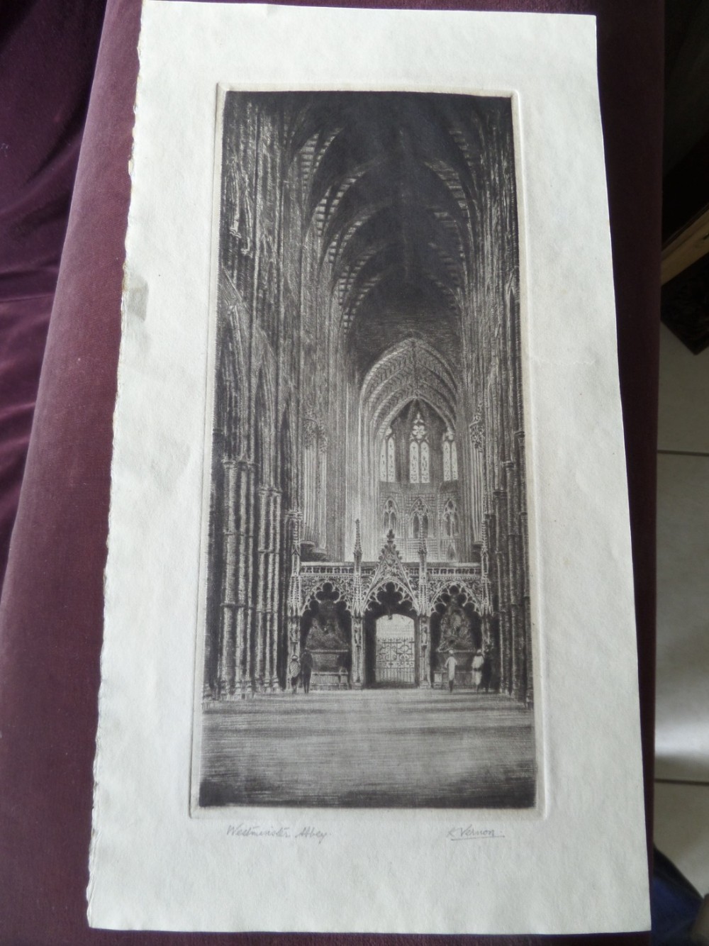 A monochrome architectural etching depicting the interior vaulted ceiling and choir screen of Westminster Abbey, signed in pencil by K Vernon.