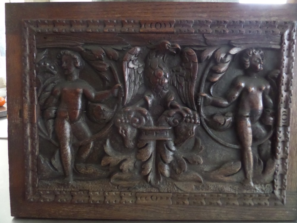16th Century Carved Oak Armorial Panel Ram's Heads, Eagle and Cherubs