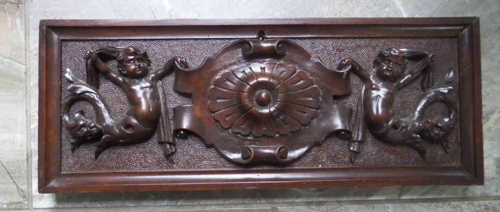 19th Century Walnut Cherub and Mythical Beast Panel