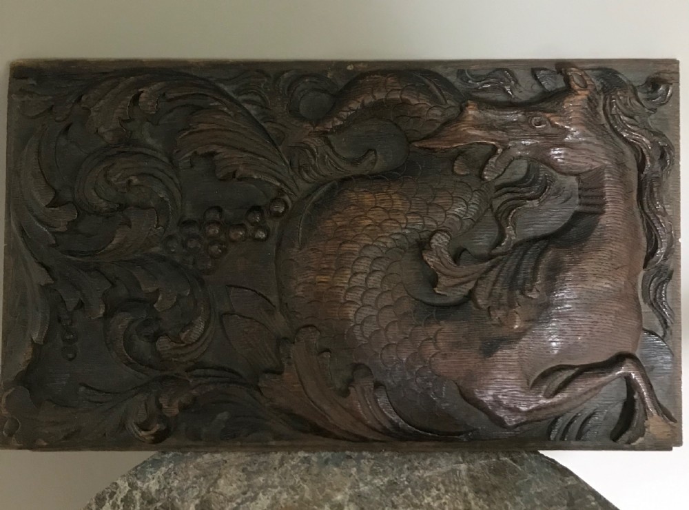 17TH CENTURY CARVED OAK MYTHICAL HIPPOCAMPUS PANEL