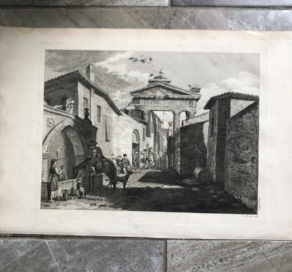An eighteenth-century monochrome architectural engraving displaying the classical front elevation of the Doric Portico in Athens with Greek inscriptions. View V