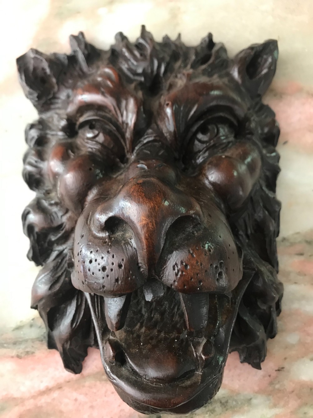 19TH CENTURY DEEPLY CARVED WALNUT LION HEAD MASK
