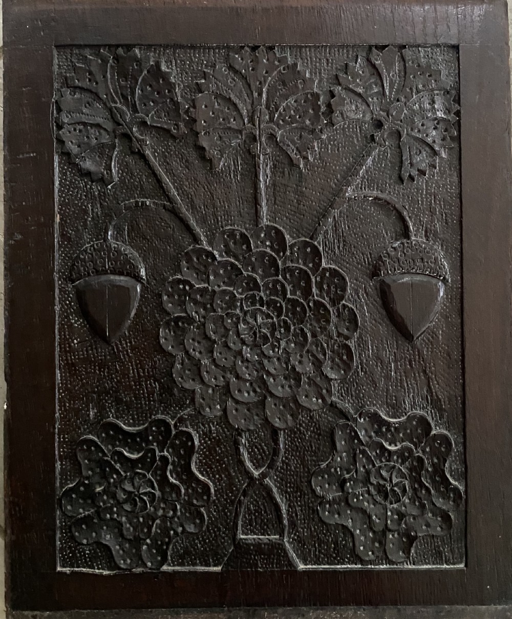 A very RARE 17th Century Oak Panel carved with cornflower, strawberries and roses and is illustrated in R W Symonds