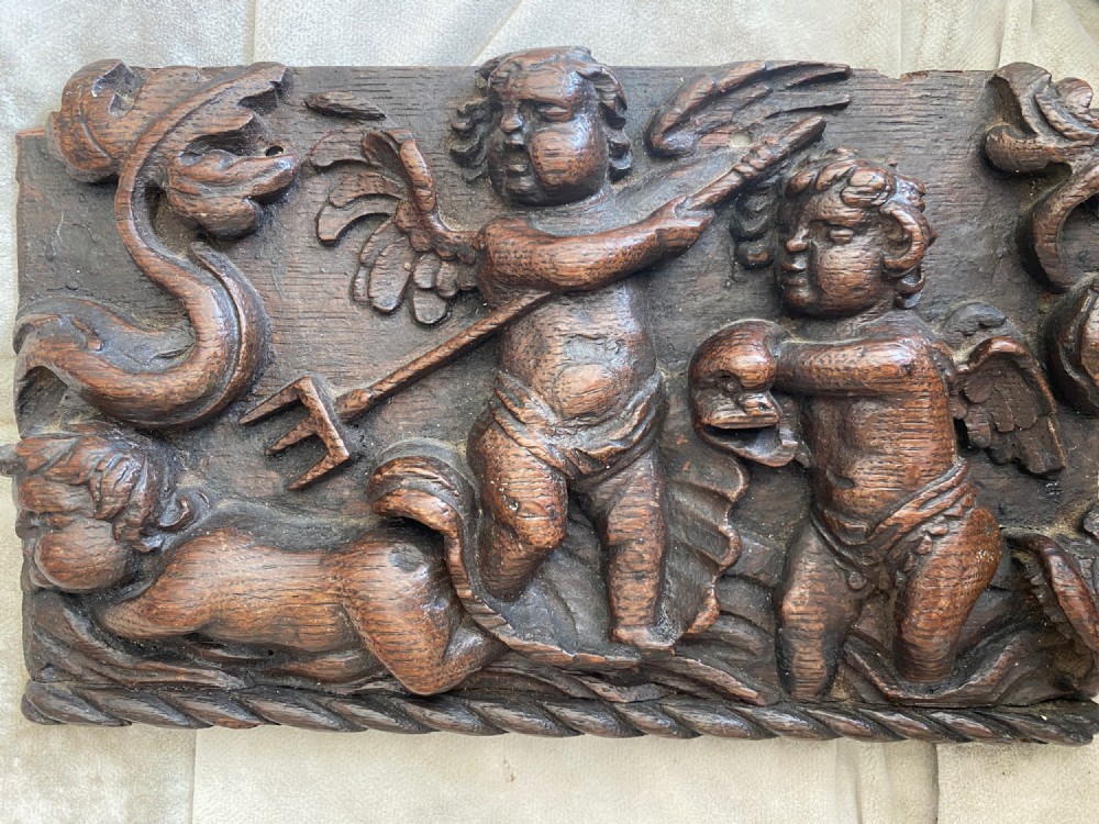 18th Century Winged Cherubs and Sea Monsters Carved Oak Panel