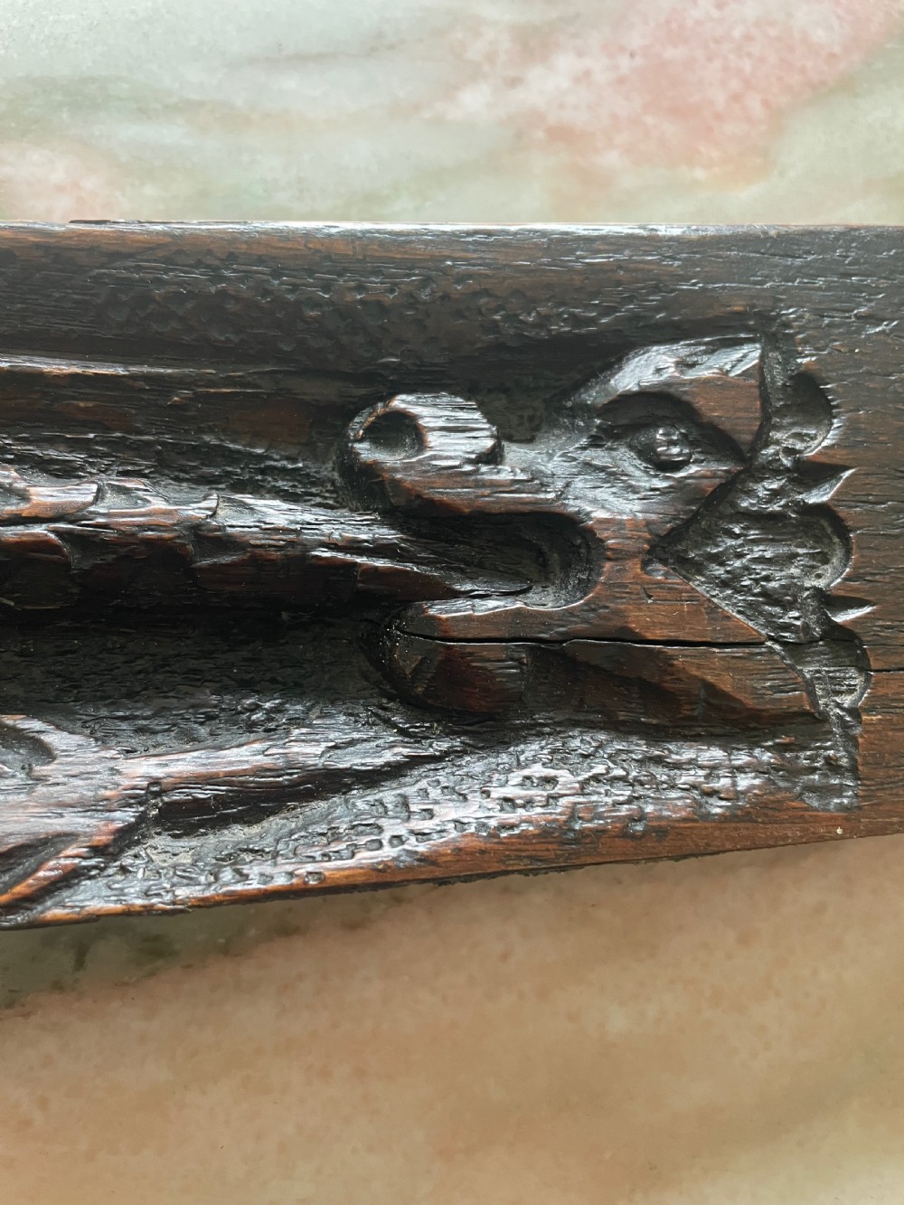 Period oak Carved Oak Panel with a Snake and Griffins View III