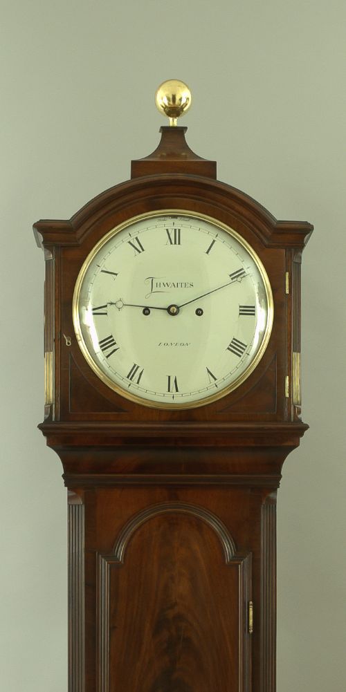 fig 1. A fine quality George III flame mahogany 8 day longcase clock by Thwaites of London.