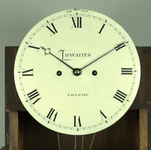 fig 2. A fine quality George III flame mahogany 8 day longcase clock by Thwaites of London.