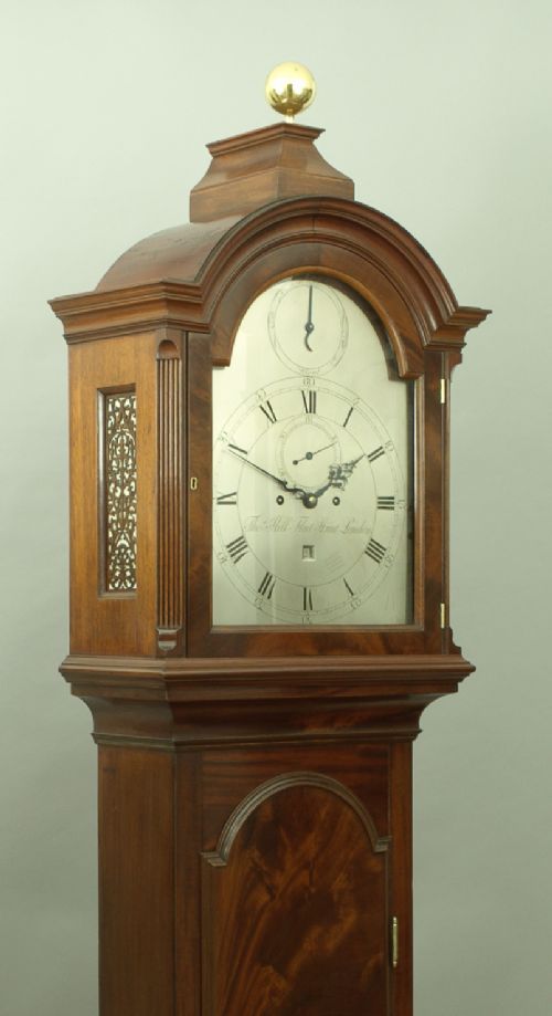 fig 2. A fine quality George III flame mahogany longcase clock