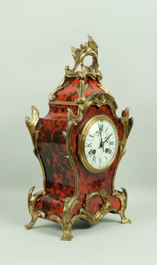 fig 1. A red tortoiseshell French mantel clock, Circa 1880