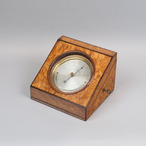 Charles Wastell Dixey & Son - London. Excellent Quality Brass-cased Aneroid Barometer in Birdseye Maple Display Case, C.1890.