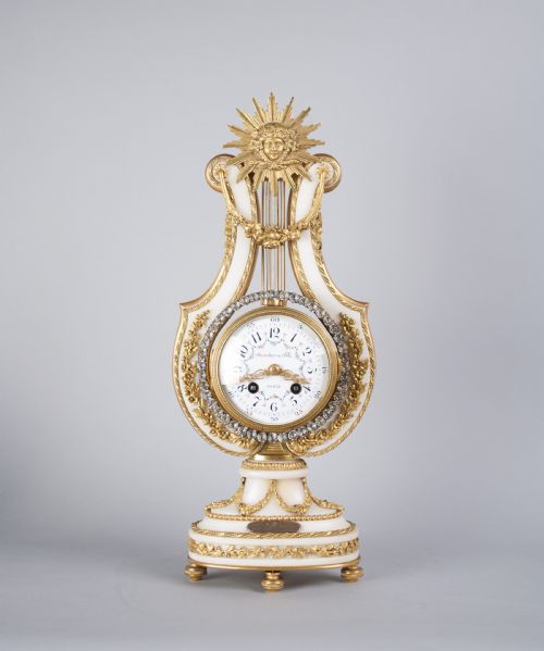 An Ormolu Mounted White Marble Striking Lyre Mantel Clock