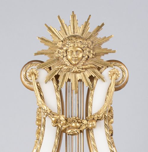fig 3. An Ormolu Mounted White Marble Striking Lyre Mantel Clock