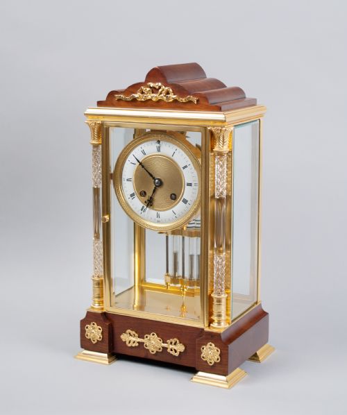 A Fine Quality Gilt Brass and Mahogany Four Glass Mantel Clock