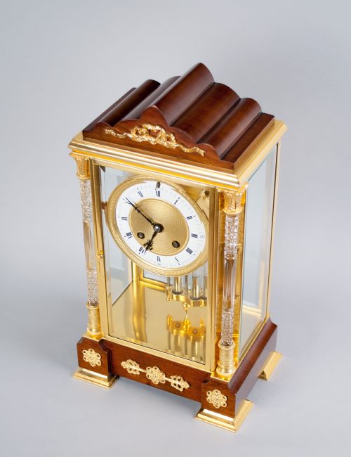 fig 1. A fine quality gilt brass and mahogany four glass mantel clock