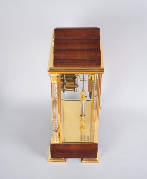fig 3. A fine quality gilt brass and mahogany four glass mantel clock