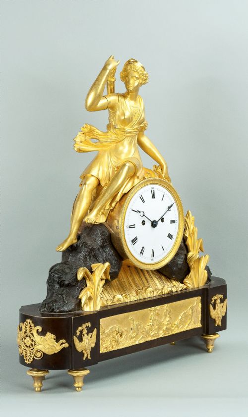 fig 1. Twin fusee bronze and ormolu mounted mantel clock by F Baetens, London.