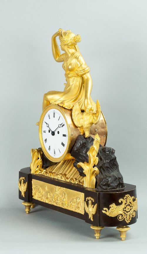 fig 2. Twin fusee bronze and ormolu mounted mantel clock by F Baetens, London.