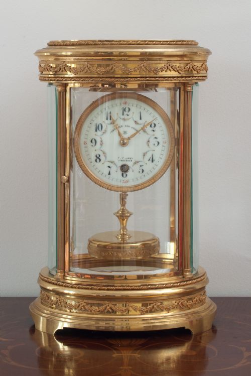 A French Claude Grivolas Oval Cased 400 Day Torsion Mantel Clock