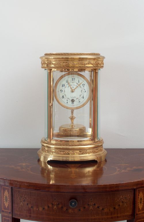 fig 1. A FRENCH CLAUDE GRIVOLAS OVAL CASED 400 DAY TORSION MANTEL CLOCK