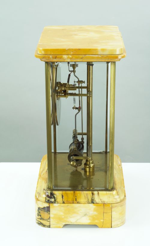 fig 4. A Sienna Marble Electric Bulle Four-glass Mantel Clock