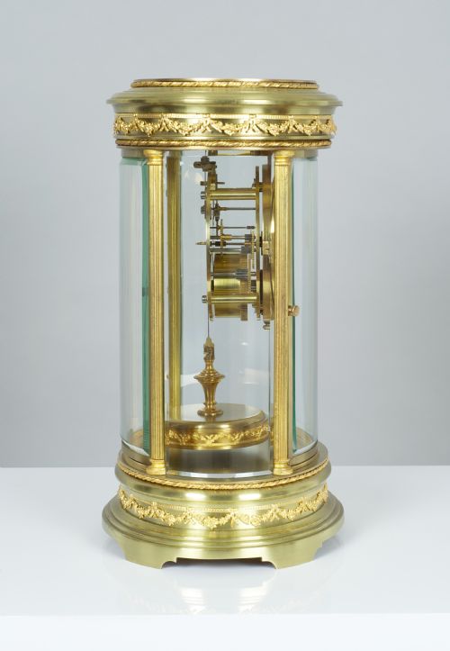 fig 1. A fine quality French Claude Grivolas Oval Cased 400 Day Torsion Mantel Clock