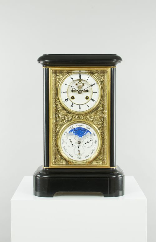 fig 1. A fine quality 19th French four-glass mantel clock with perpetual calendar and moonphase indication.