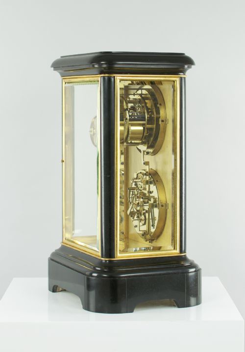 fig 2. A fine quality 19th French four-glass mantel clock with perpetual calendar and moonphase indication.