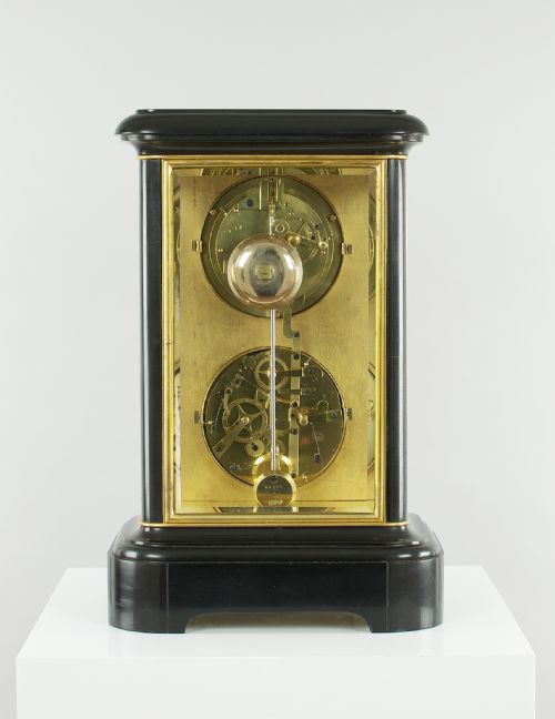 fig 3. A fine quality 19th French four-glass mantel clock with perpetual calendar and moonphase indication.