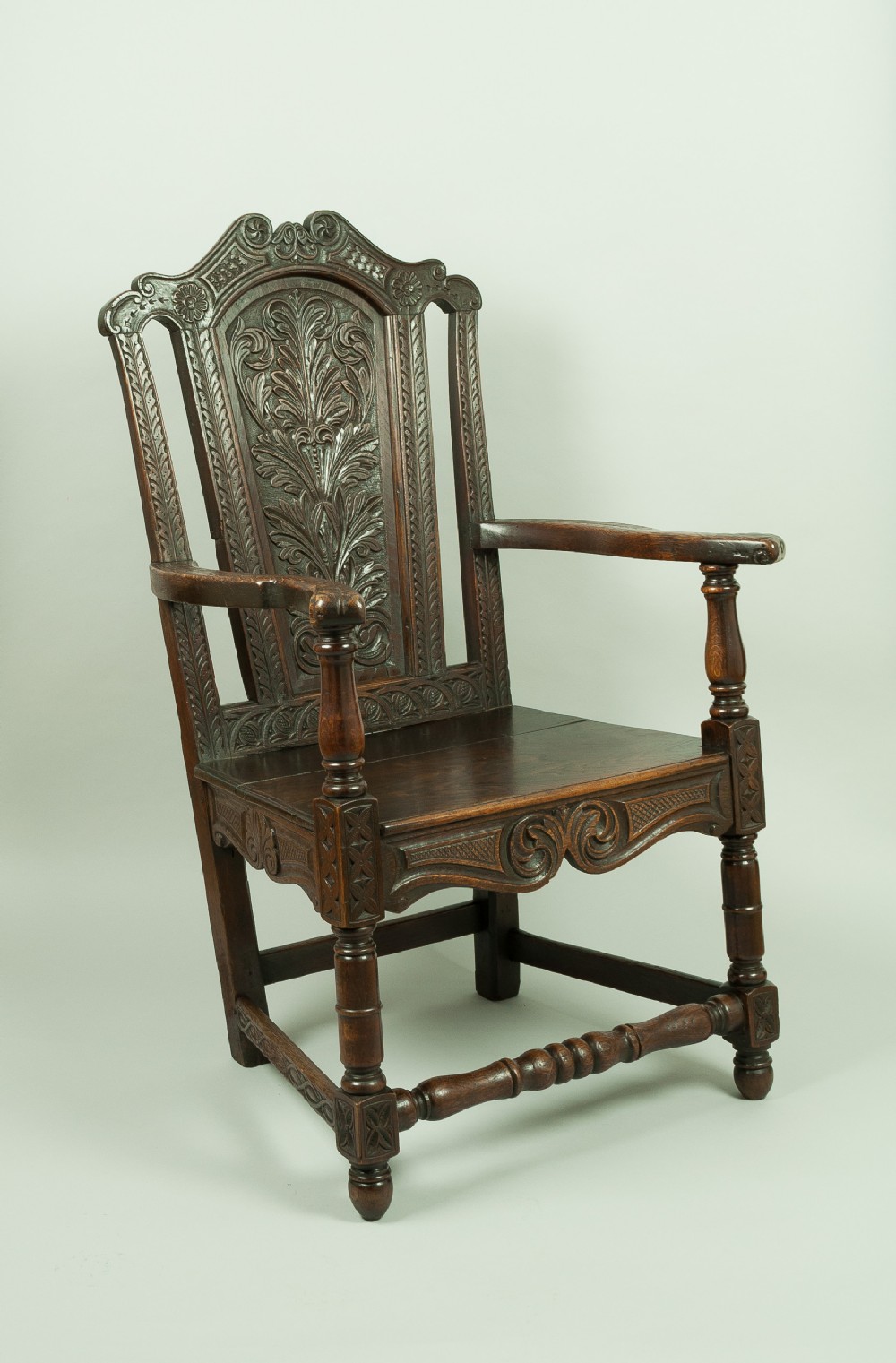 A Good Quality Carved Oak Armchair