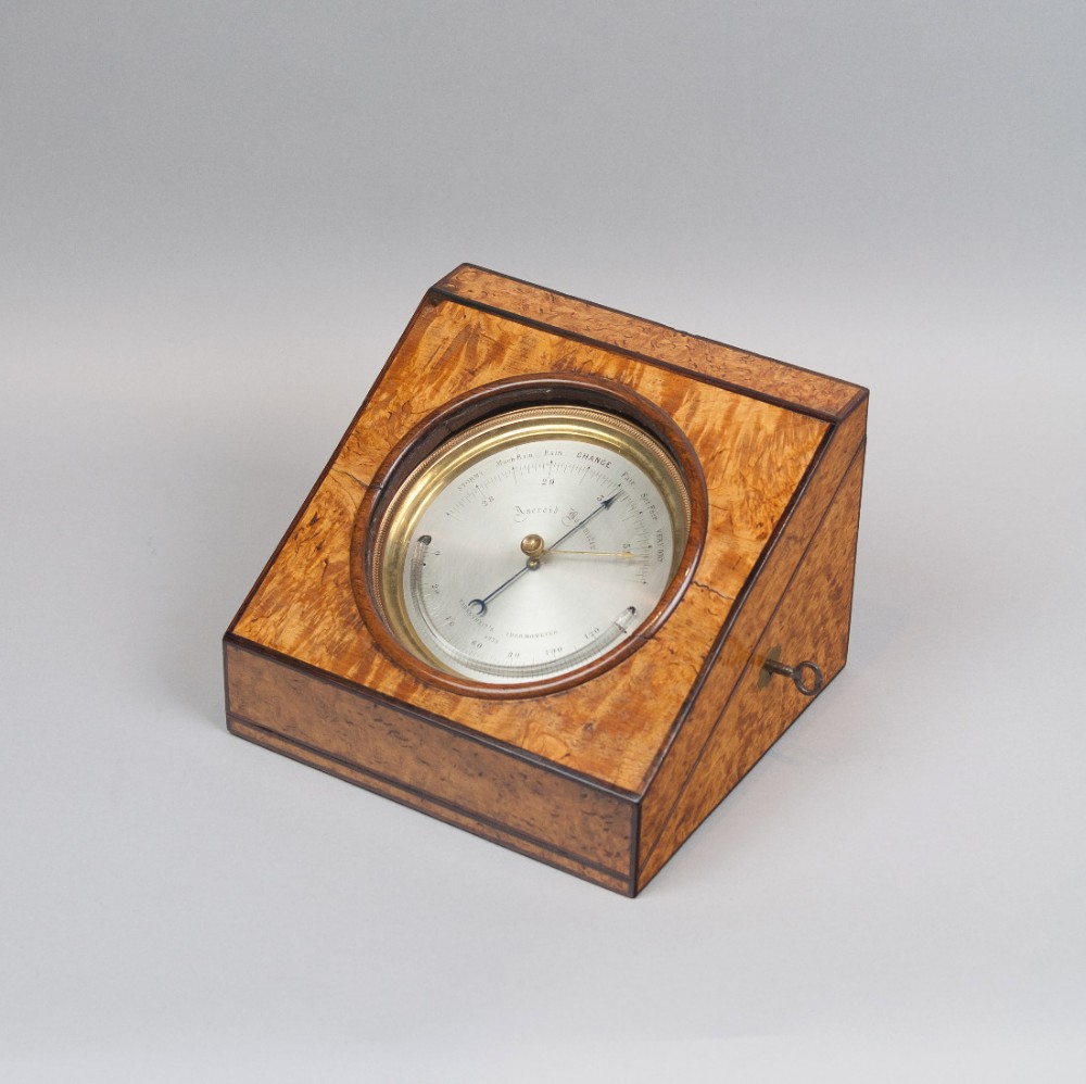 Charles Wastell Dixey & Son - London. Excellent quality brass-cased aneroid barometer in birdseye maple display case, c.1890.