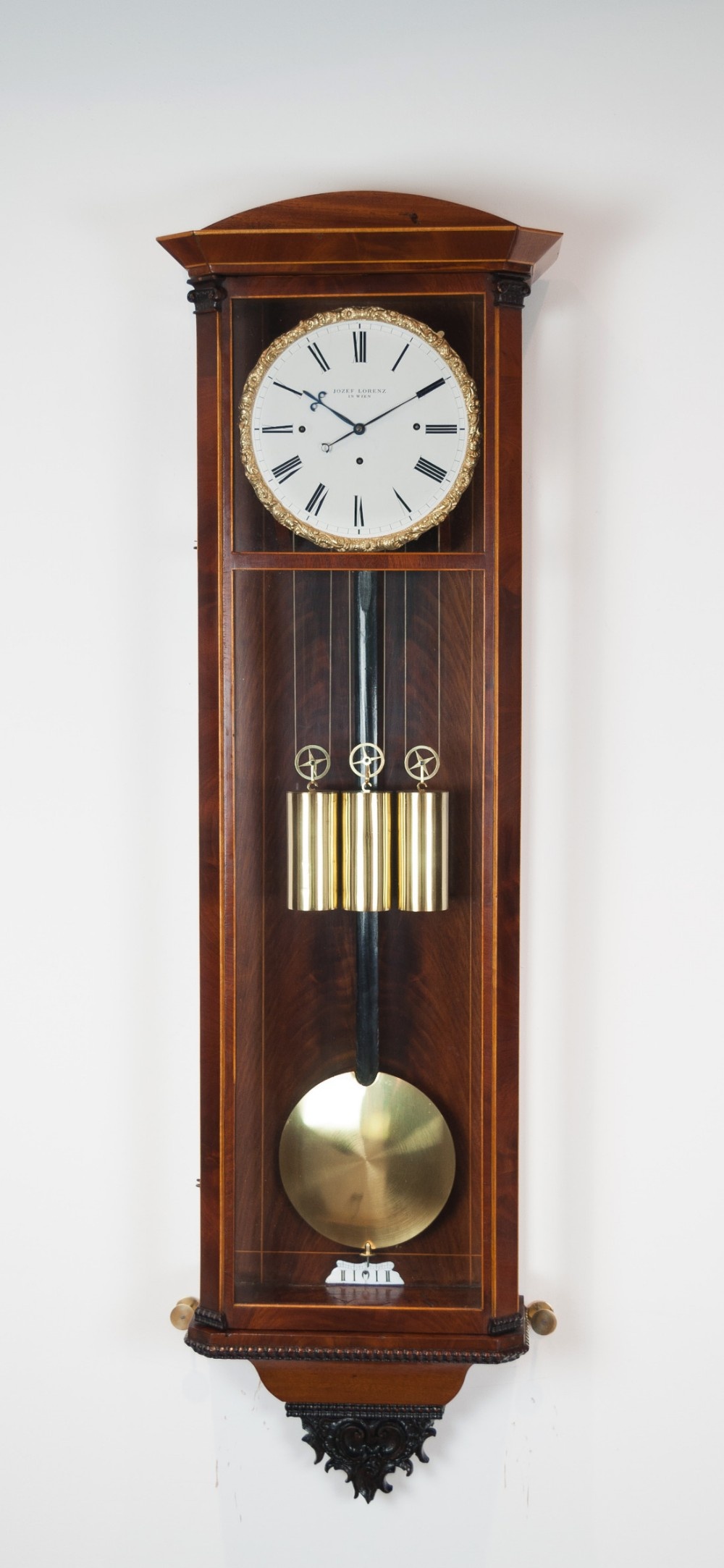 A flame mahogany Biedermeier Viennese Wall Regulator, circa 1850
