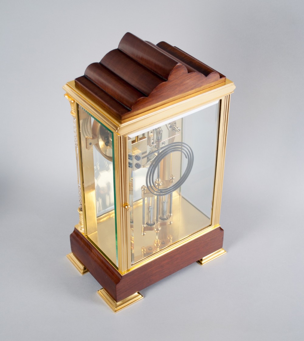 A fine quality gilt brass and mahogany four glass mantel clock View VIII