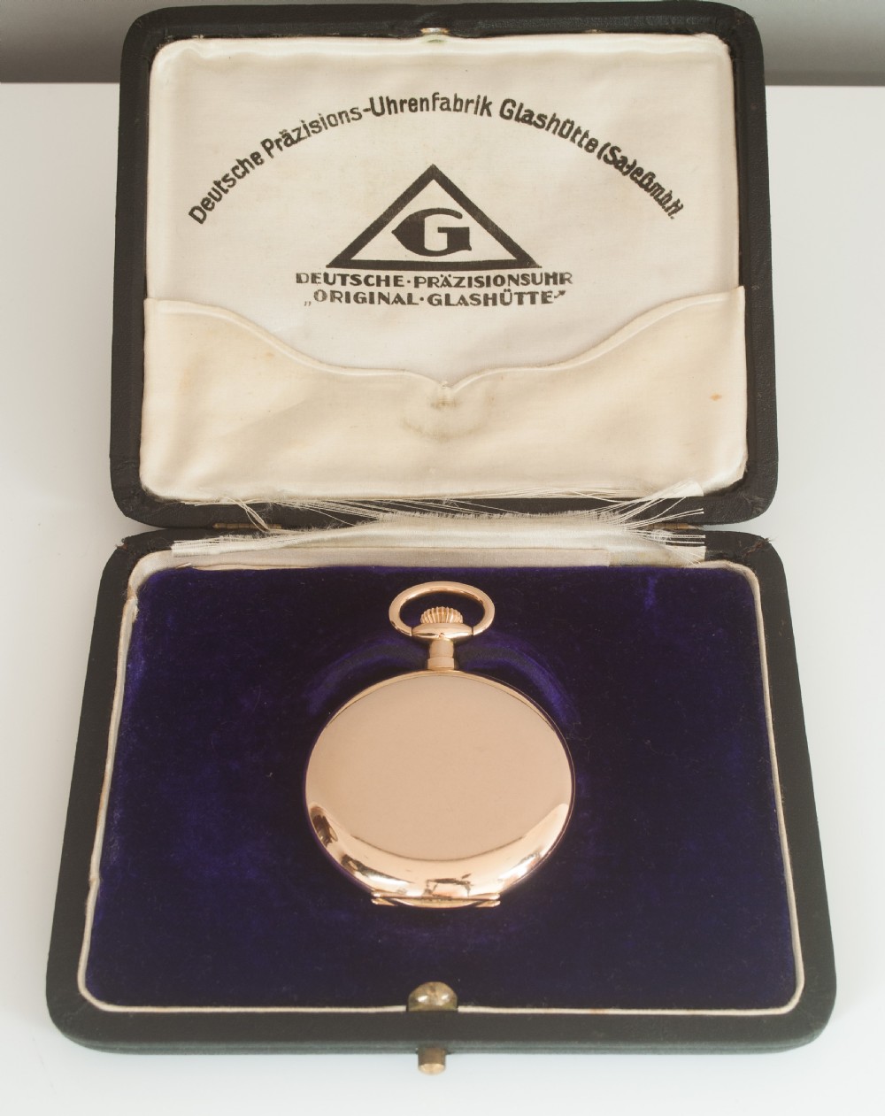GLASHUTTE ORIGINAL. A FINE QUALITY 14K GOLD HUNTER CASE LEVER POCKET WATCH.