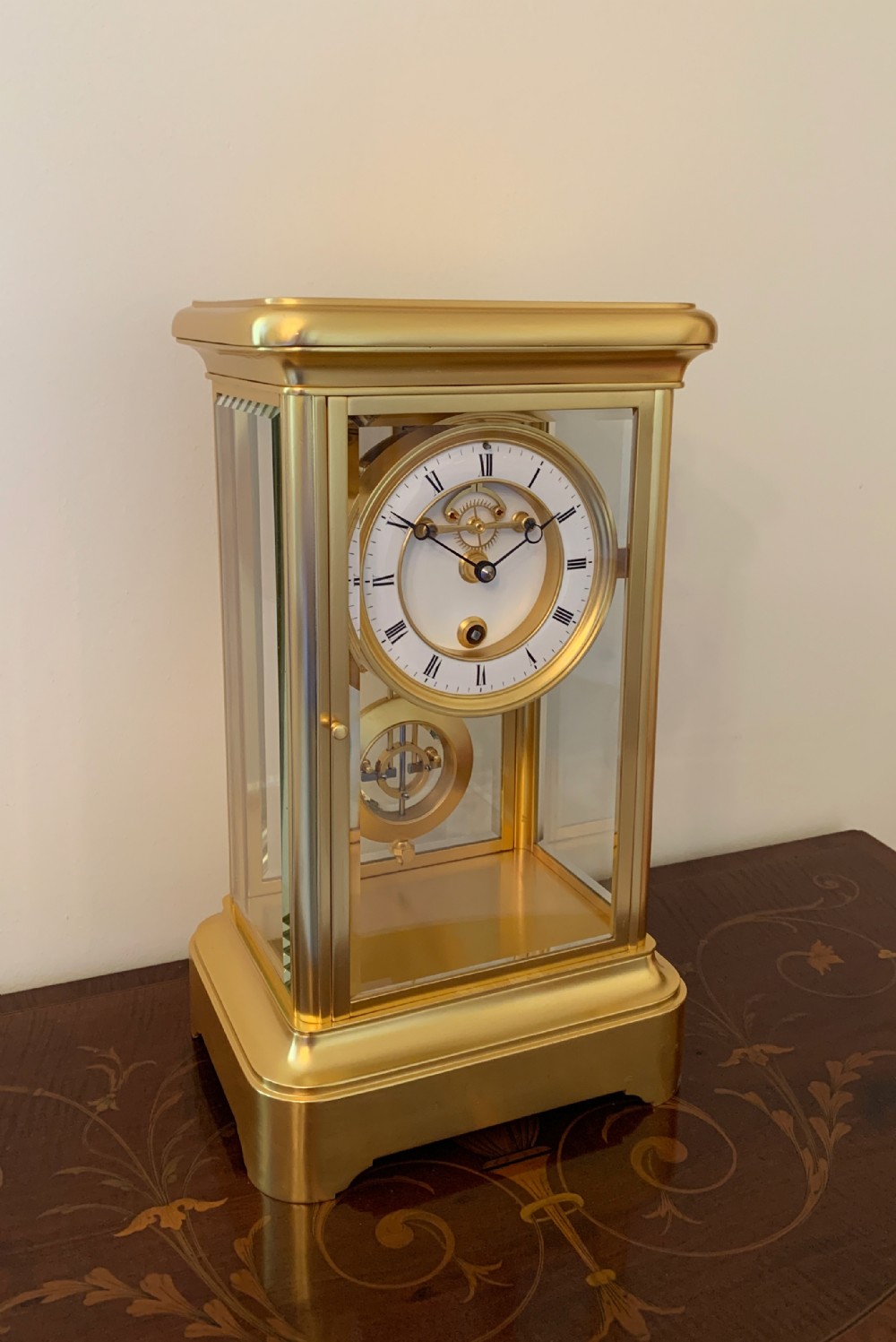 A rare one year duration French gilt brass four-glass mantel timepiece, circa 1880.