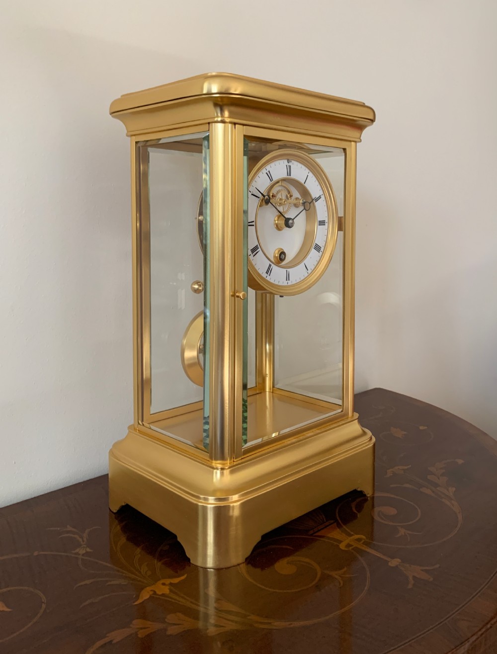 A rare one year duration French gilt brass four-glass mantel timepiece, circa 1880. View VIII
