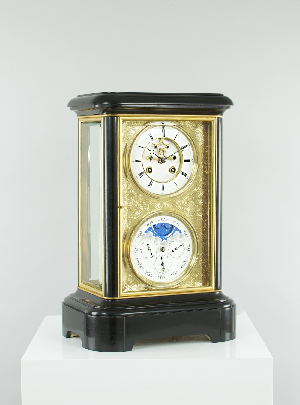 A fine quality 19th French four-glass mantel clock with perpetual calendar and moonphase indication.