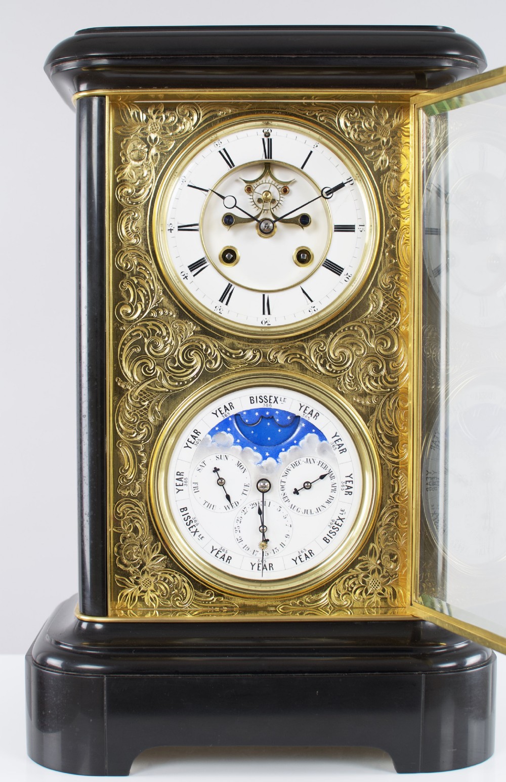 A fine quality 19th French four-glass mantel clock with perpetual calendar and moonphase indication. View V