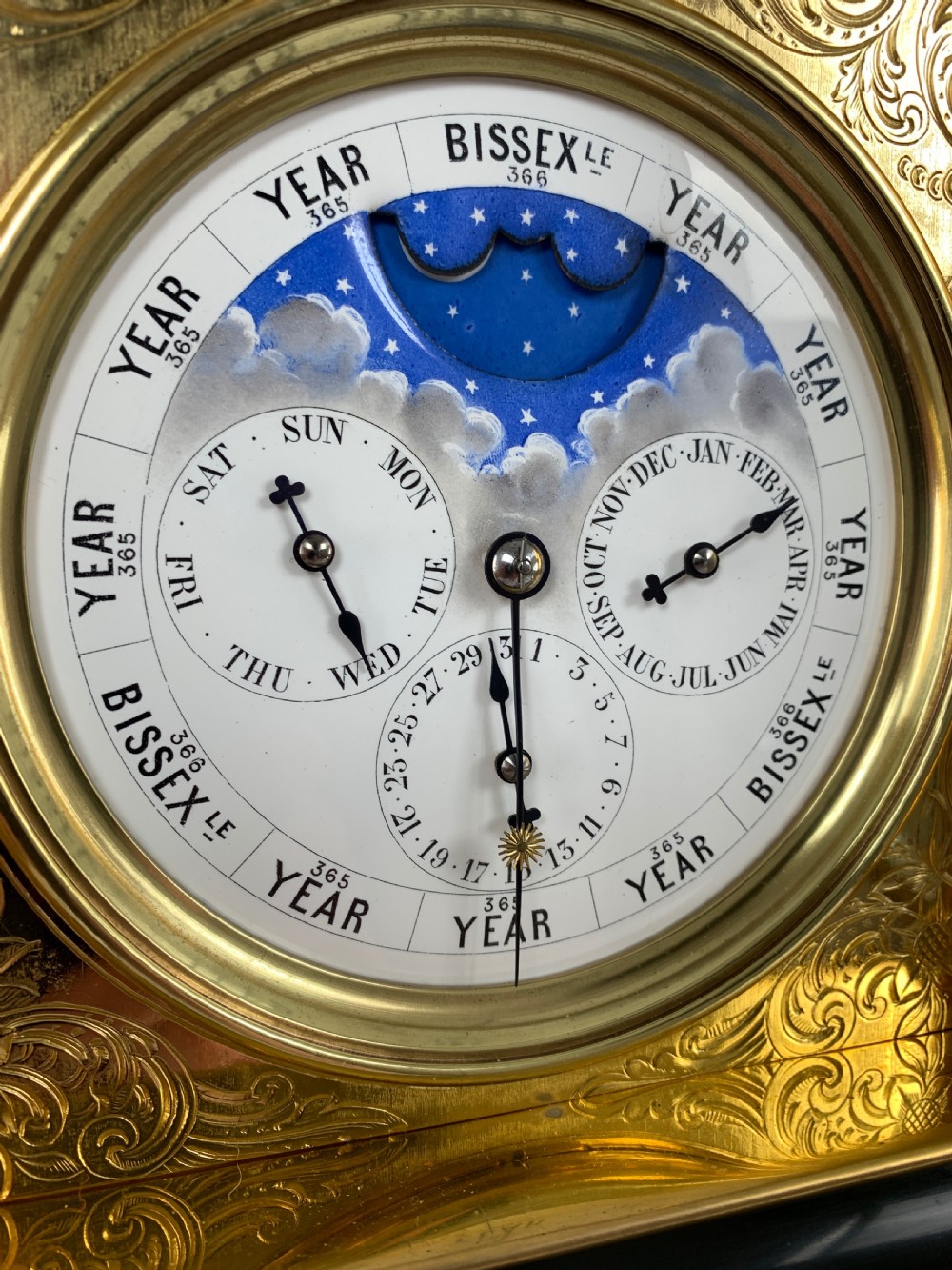 A fine quality 19th French four-glass mantel clock with perpetual calendar and moonphase indication. View X