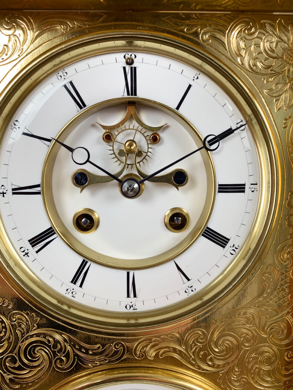 A fine quality 19th French four-glass mantel clock with perpetual calendar and moonphase indication. View XI