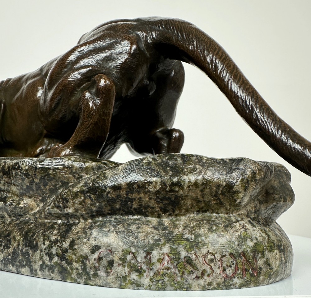 A patinated dark brown bronze sculpture depicting a crouching panther drinking water from a speckled grey stone base. View XIV