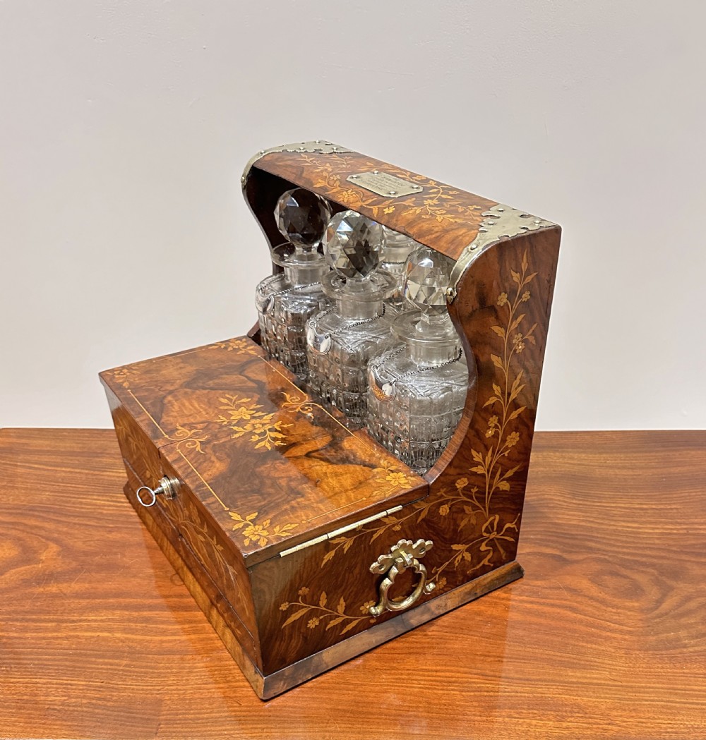A Fine Quality Inlaid Walnut Three Decanter Tantalus & Games Box. View II