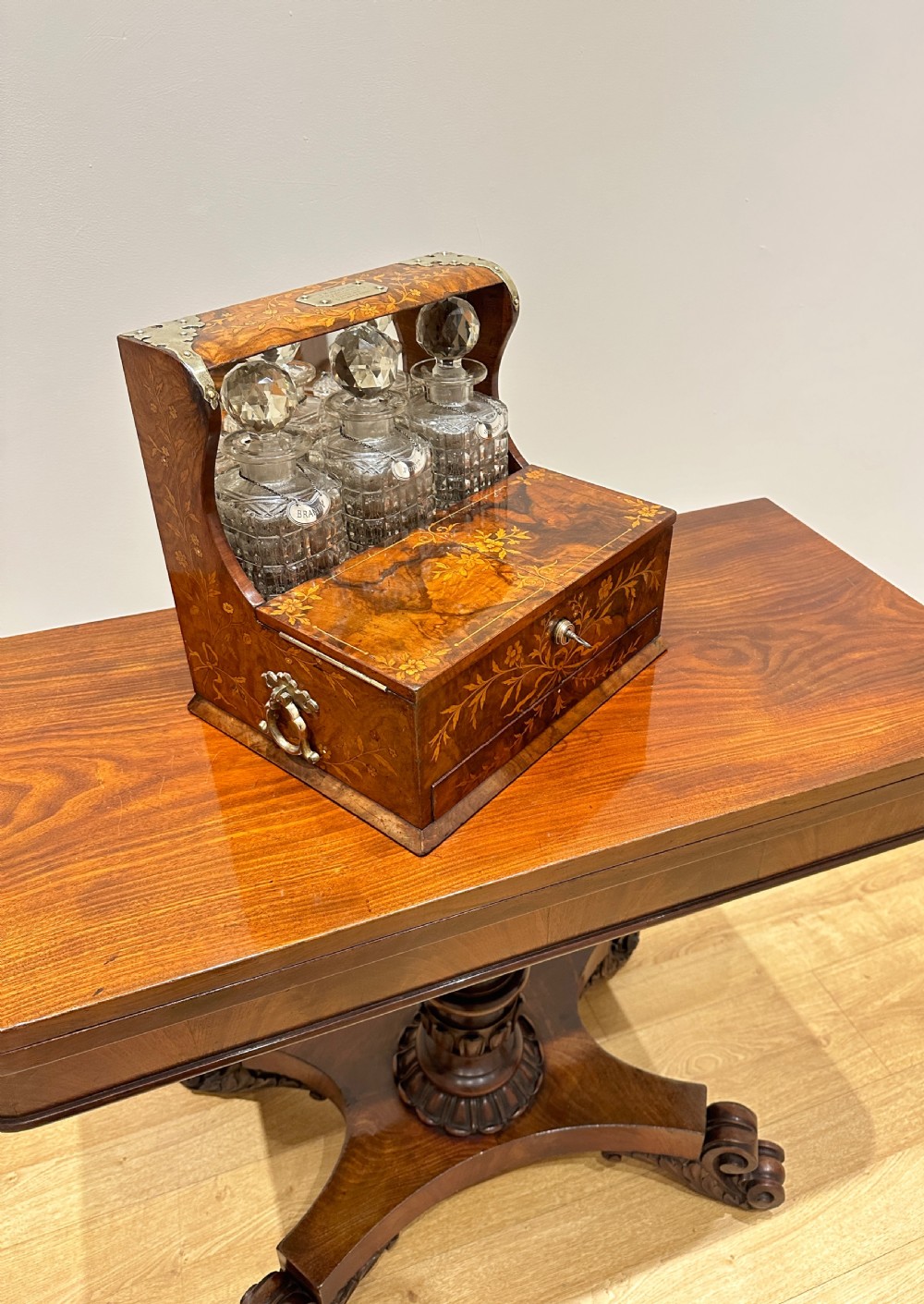 A Fine Quality Inlaid Walnut Three Decanter Tantalus & Games Box. View III