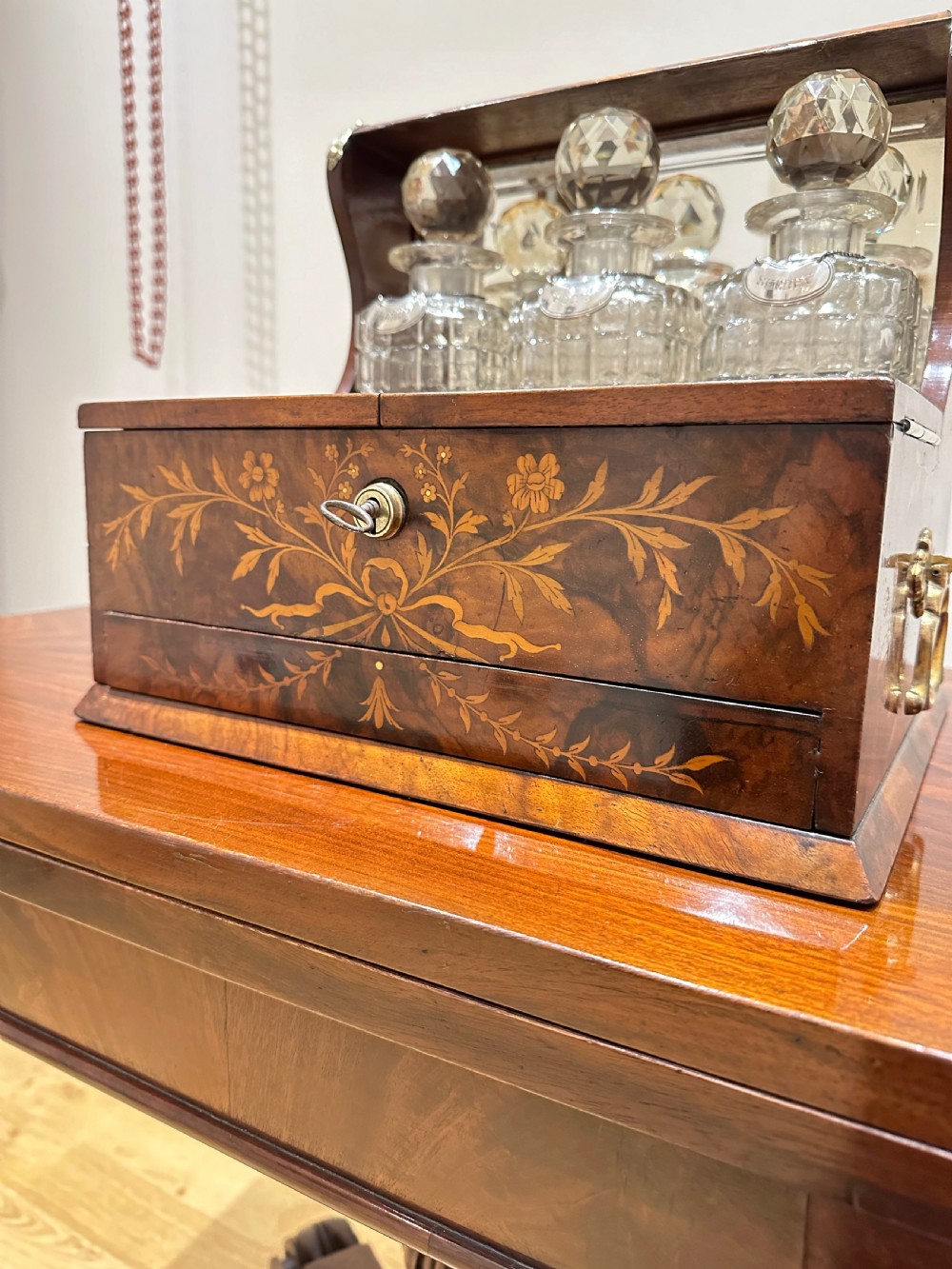 A Fine Quality Inlaid Walnut Three Decanter Tantalus & Games Box. View VII